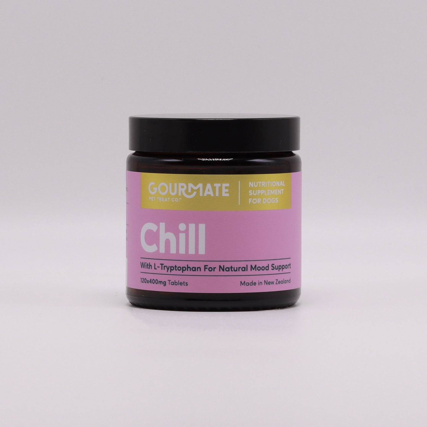 The Gourmate Pet Treat Co. Chill supplement for dogs supports mood with L-Tryptophan and Green Lipped Mussel, housed in a pink and yellow labeled jar containing 120 x 400mg tablets, crafted in New Zealand.