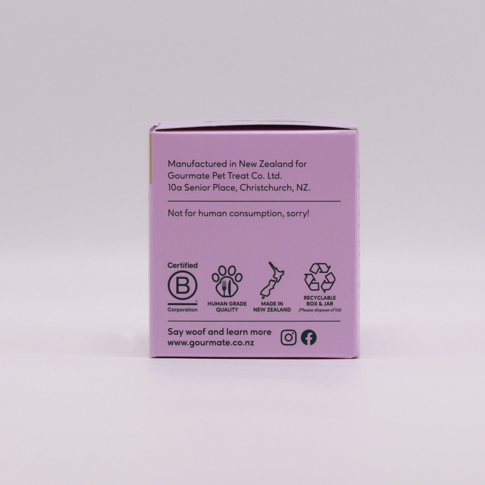 The purple box, highlighting its New Zealand origin and human-grade quality, showcases the Gourmate Pet Treat Co.'s Chill With L-Tryptophan for Natural Mood Support, enriched with Green Lipped Mussel and recyclable materials.