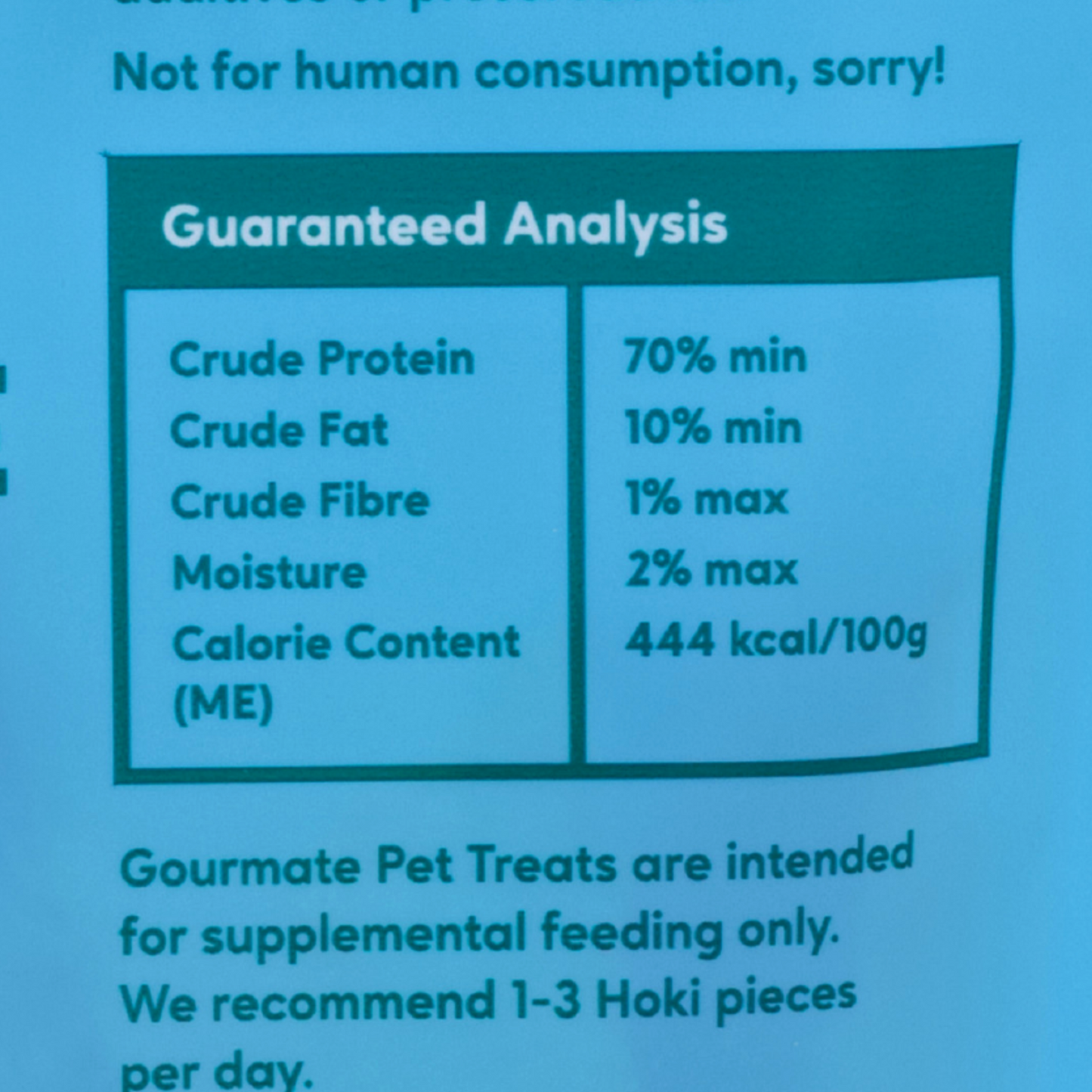 The Gourmate Pet Treat Co. South Pacific Hoki label guarantees: 70% min crude protein, 10% min crude fat, 1% max crude fiber, and 2% max moisture with a calorie content of 444 kcal/100g. Ideal for hypoallergenic diets and rich in omega-3 for enhanced pet health.