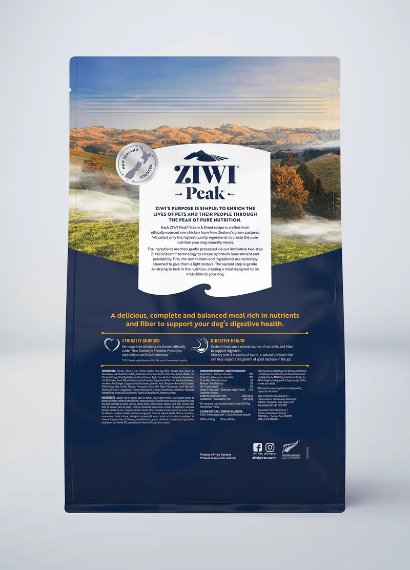 Bag of Your Whole Dog Ziwi Peak: Steam & Dried Chicken with Orchard Fruits Recipe dog food with a scenic backdrop on the packaging and detailed product information at the front.