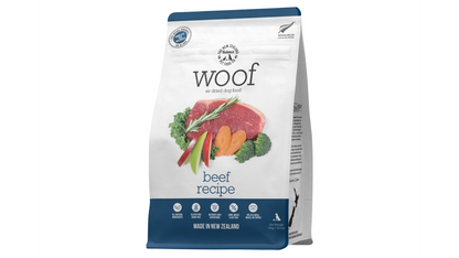 A package of "Your Whole Dog" air-dried dog food with a healthy beef recipe, featuring images of fresh ingredients and boasting New Zealand origin.