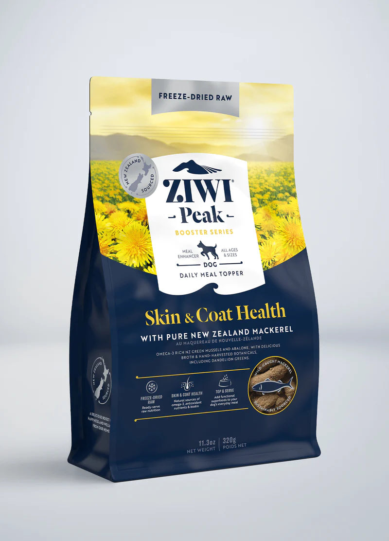 A blue and yellow bag of Ziwi Peak's Freeze-Dried Booster for Skin & Coat Health features raw New Zealand mackerel, omega-3, natural oils, and nutrient-rich superfoods.