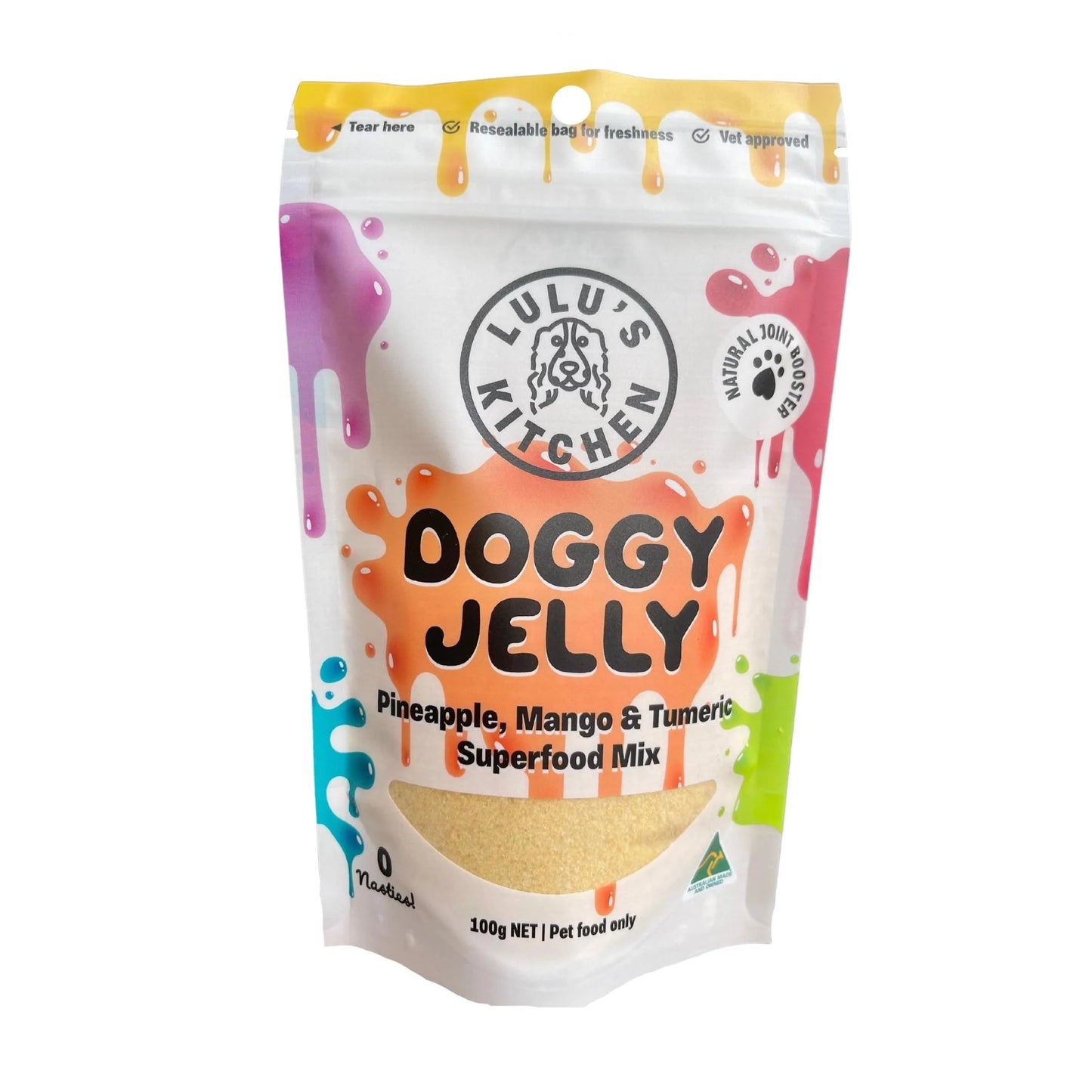A 100g pack of Lulu's Kitchen Doggy Jelly features pineapple, mango, and turmeric flavors. The packaging has colorful splashes and is clearly labeled as pet food only.