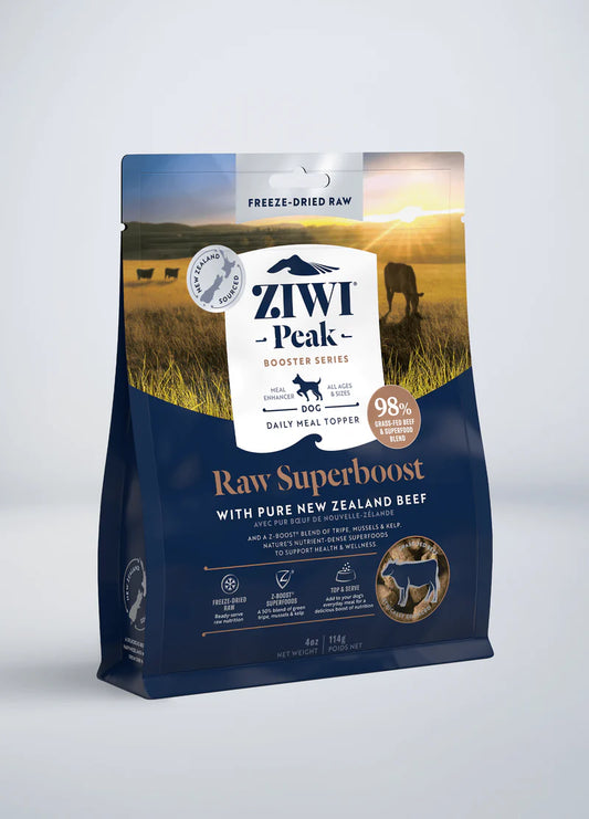 A bag of Your Whole Dog SALE: ZIWI Peak Freeze-Dried Raw Superboost Beef pet food with a New Zealand pasture background.