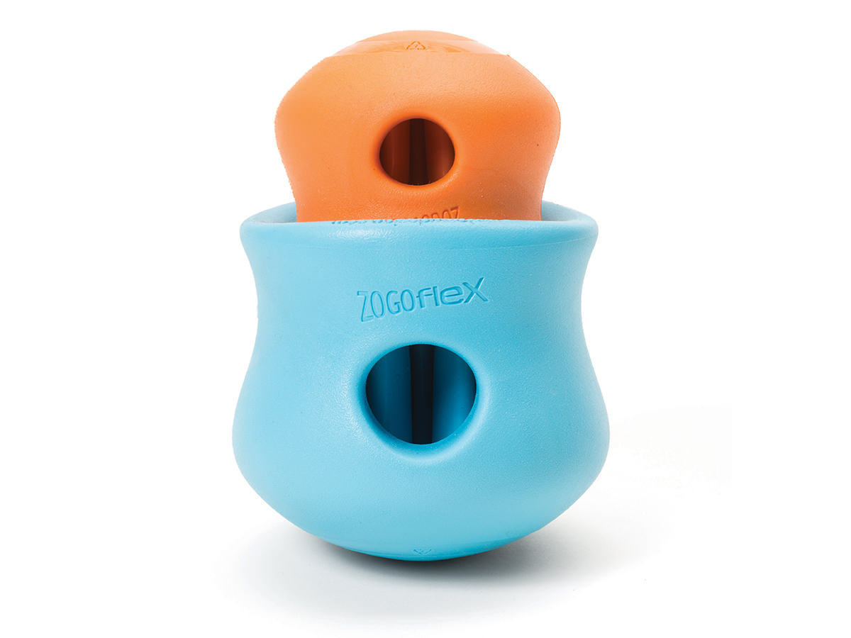 A small orange and large blue West Paw Toppl dog toy on a white background at Your Whole Dog