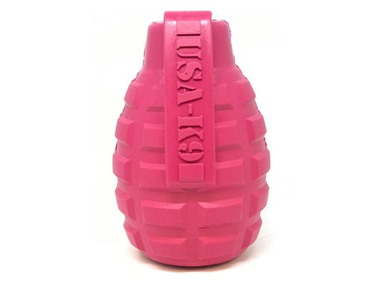 A pink CLEARANCE: Soda Pup GRENADE TOY & TREAT DISPENSER (PINK - for teething puppies) by Your Whole Dog, perfect for dog enrichment toys and treat dispensers.