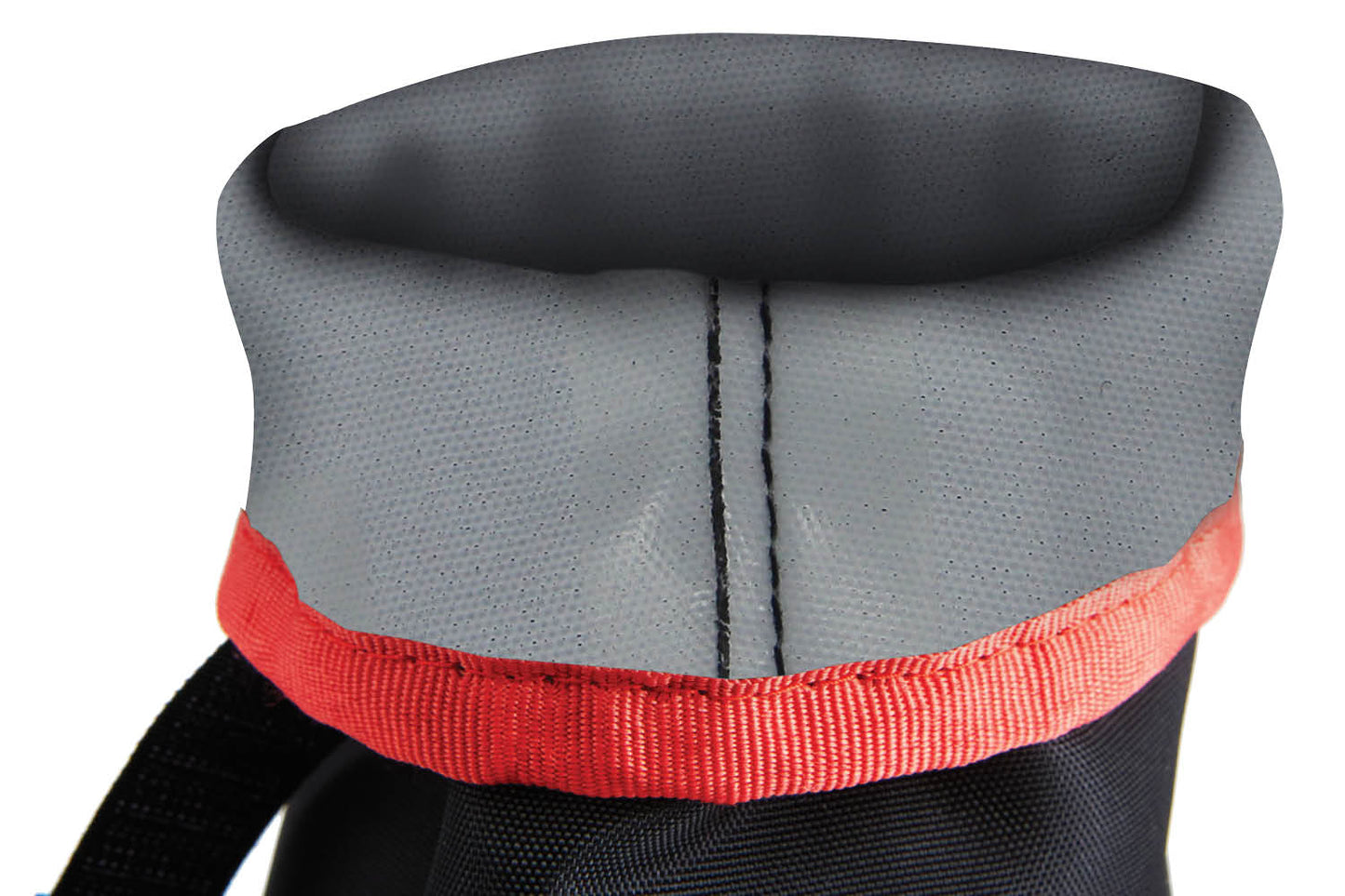 Close-up of the top of a gray and red MediPaw Soft Bandage (Basic) Boot by Your Whole Dog, featuring visible stitching and a black side strap. The design is evocative of a waterproof nylon shell, ensuring both durability and functionality.