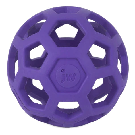 A purple, rubber Your Whole Dog JW Hol-ee Roller features a lattice-style design with the initials "jw" embossed at its center.