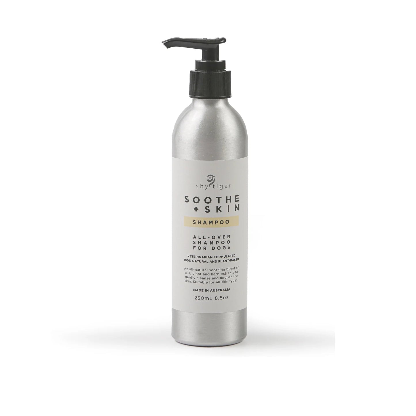 Silver bottle of Shy Tiger Soothe + Skin Shampoo by Your Whole Dog, a natural concentrate for dogs enriched with essential oils and plant extracts, featuring a convenient pump dispenser, in a 250ml size.