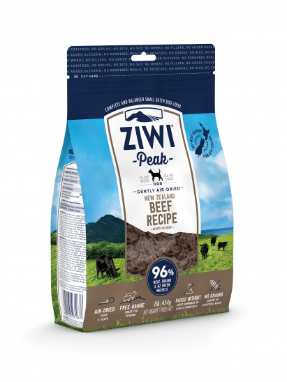 A bag of ZIWI Peak Air-Dried Beef Recipe for Dogs highlights the nutritional benefits of grass-fed beef, featuring grasslands and cows. It's an ideal wholesome dog training treat, emphasizing its superior quality.
