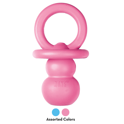 A pink KONG Puppy Binkie pacifier shaped like a ball.
