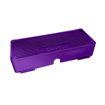 A rectangular purple vent cover with horizontal slats and the word "Flexiness FlexBloxBar" from Your Whole Dog embossed on the front center.