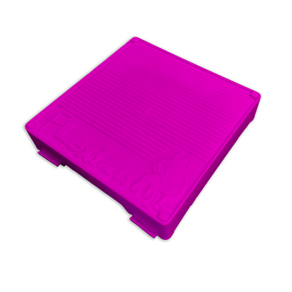 A stackable pink plastic tray on a white background, providing a training experience with Flexiness FlexBlox from Your Whole Dog.