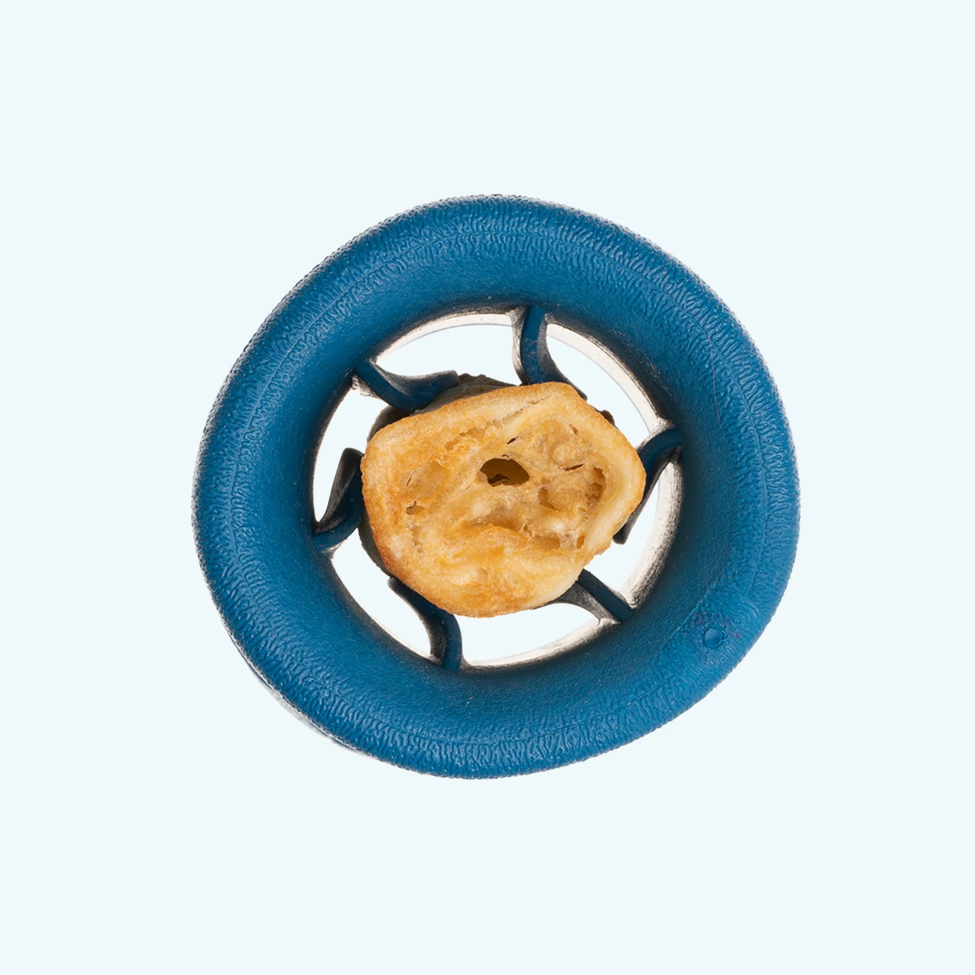The West Paw Funnl is a round blue dog toy by West Paw, designed to hold an edible treat in the center. Perfect for fetch, it's shown against a white background.