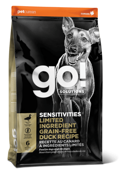 Bag of Go! Solutions SENSITIVITIES Grain Free Limited Ingredient Duck Recipe Dog Food by Go! Solutions, ideal for dogs with sensitivities, featuring a happy dog and detailed product info on the packaging.