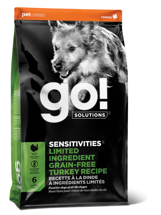 A black and green bag of Go! Solutions SENSITIVITIES Grain Free Limited Ingredient Turkey Recipe Dog Food features a dog image and product details—ideal for dogs needing limited ingredient diets.