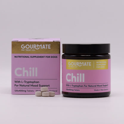 A jar and box of Gourmate Pet Treat Co. "Chill With L-Tryptophan for Natural Mood Support" supplements for dogs, by Your Whole Dog, featuring mood-supporting L-Tryptophan and enriched with Marine Collagen. Made in New Zealand, it includes three additional tablets.