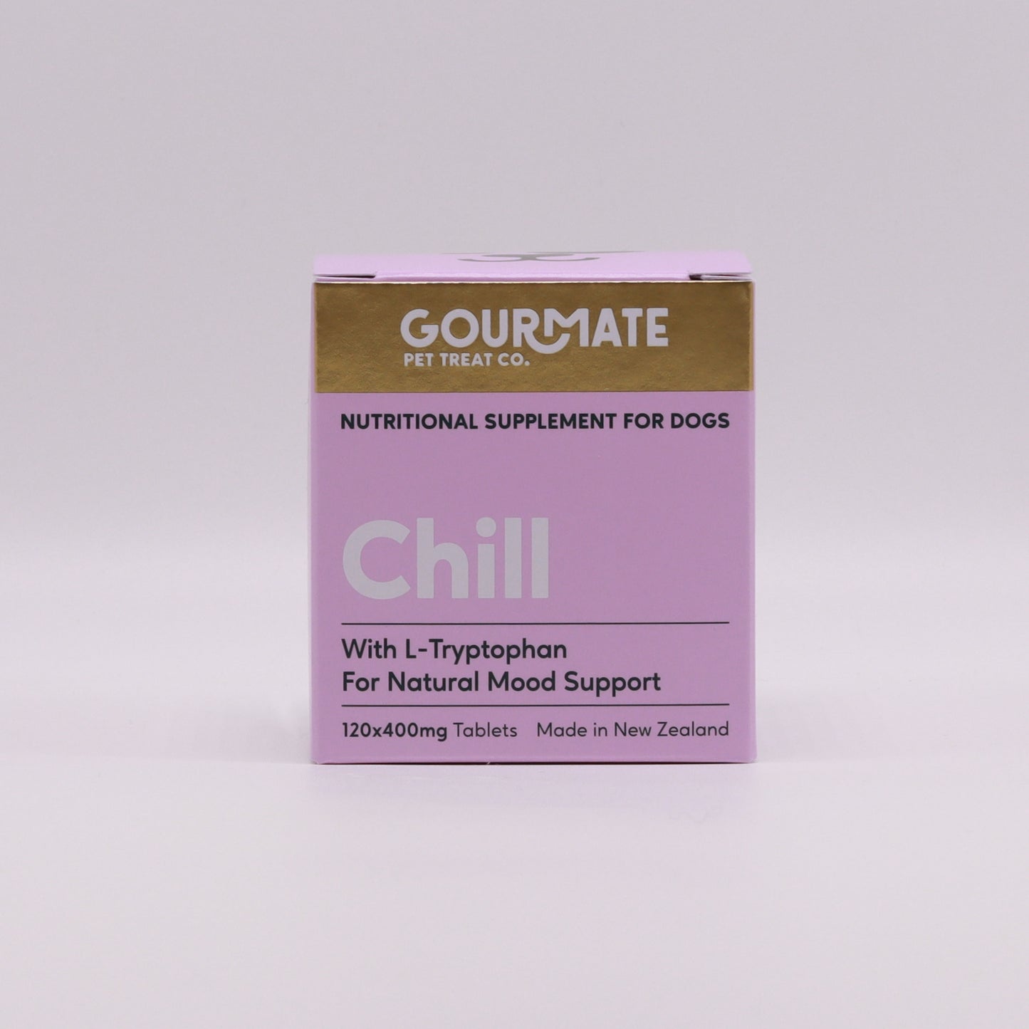 Pink and gold box of Your Whole Dog's Gourmate Pet Treat Co. Chill with L-Tryptophan for Natural Mood Support, a nutritional supplement for dogs containing Dog Collagen, 120 tablets, made in New Zealand.