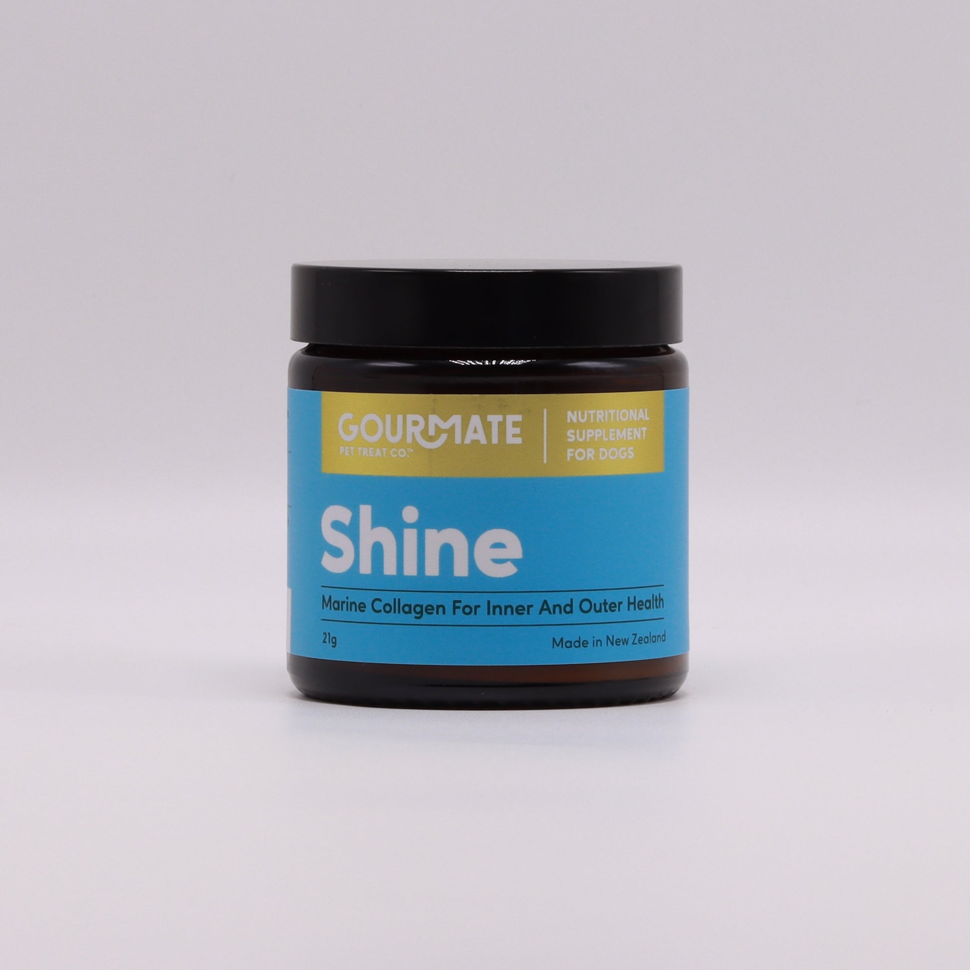 A jar of Gourmate Pet Treat Co. Shine Marine Collagen For Inner And Outer Health, a nutritional supplement from Your Whole Dog, features marine collagen and Green Lipped Mussel Oil. This New Zealand product supports joint health in dogs, offering the added benefit of omega-3s.