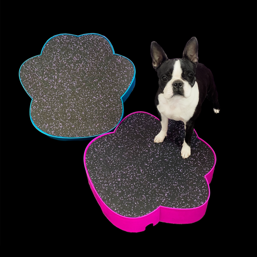 A Boston Terrier standing next to a Flexiness PawMat - PRE-ORDER available for pre-order from Your Whole Dog.
