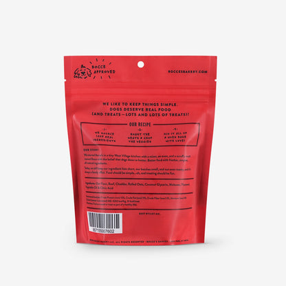A red bag with black text, offering limited ingredients and all-natural preservatives for softer cookies, featuring Bocce's Bakery: Say Moo Soft & Chewy Treats (6oz/170g) from Your Whole Dog.