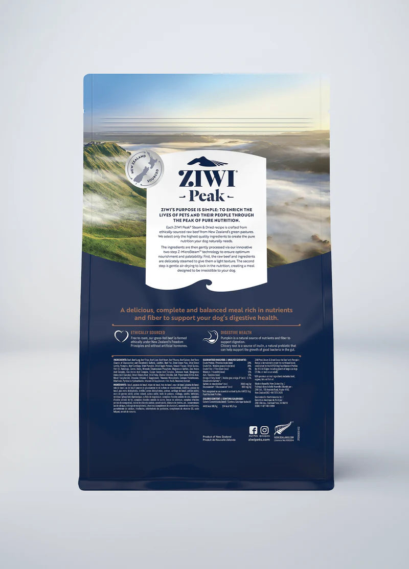 The ZIWI Peak Steam & Dried Beef with Pumpkin Recipe for Dogs bag features a scenic backdrop and detailed product info, highlighting Ziwi Peak's commitment to raw nutrition and superior digestion support.