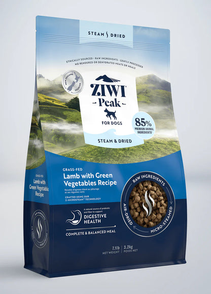 A bag of ZIWI Peak: Steam & Dried Lamb with Green Vegetables Recipe dog food, highlighting its 85% animal ingredients and grass-fed lamb content on the packaging from Your Whole Dog.