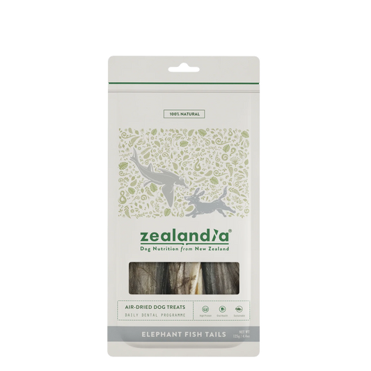 A white pack of Your Whole Dog Zealandia Elephant Fish Tail Chews features fish images and a clear window with visible treats—these novel protein dog chews naturally support your pup’s dental health.