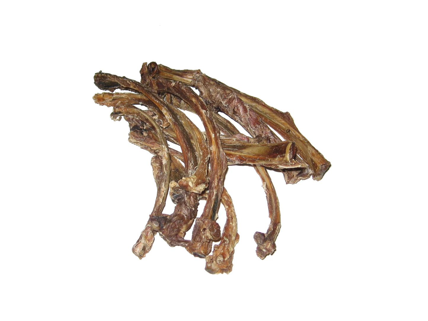 A pile of Zealandia Veal Ribbies Air-Dried Dog Chews from Your Whole Dog is displayed on a white background.