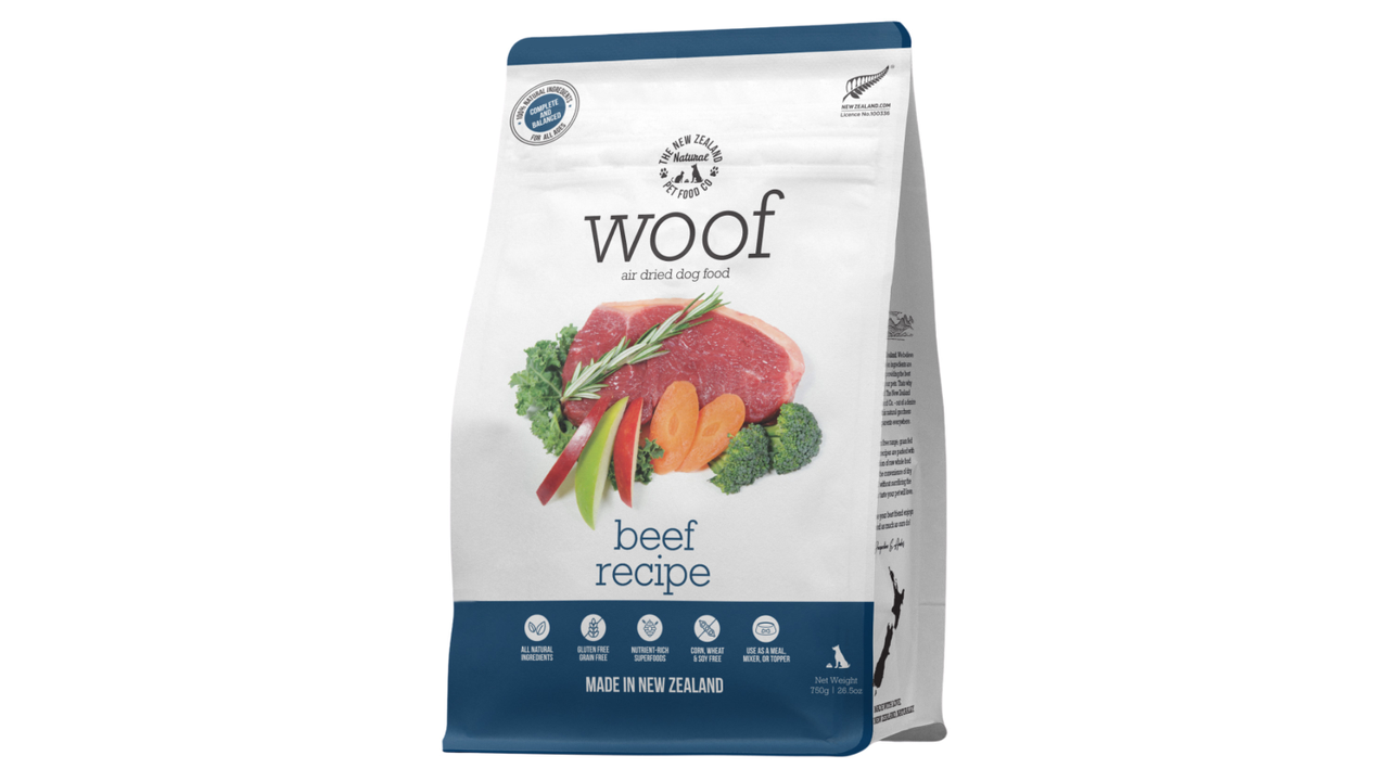A package of "Your Whole Dog" air-dried dog food with a healthy beef recipe, featuring images of fresh ingredients and boasting New Zealand origin.