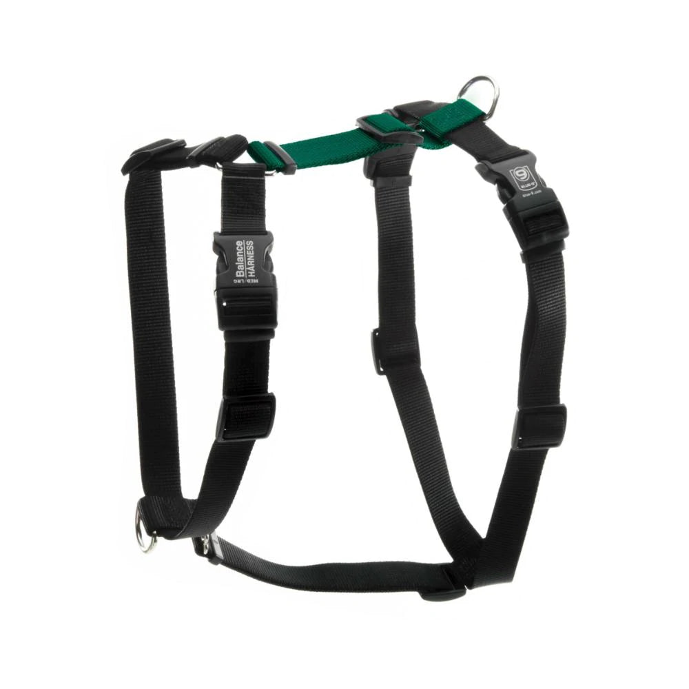 A Blue-9: Balance Harness from Your Whole Dog, with black and green colours, is featured on a white background.