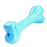 A blue, bone-shaped dog toy with a hole near one end, featuring a smooth, shiny surface, perfect for moderate chewers seeking chewy goodness: CLEARANCE: Planet Dog ORBEE-TUFF BONE by Your Whole Dog.