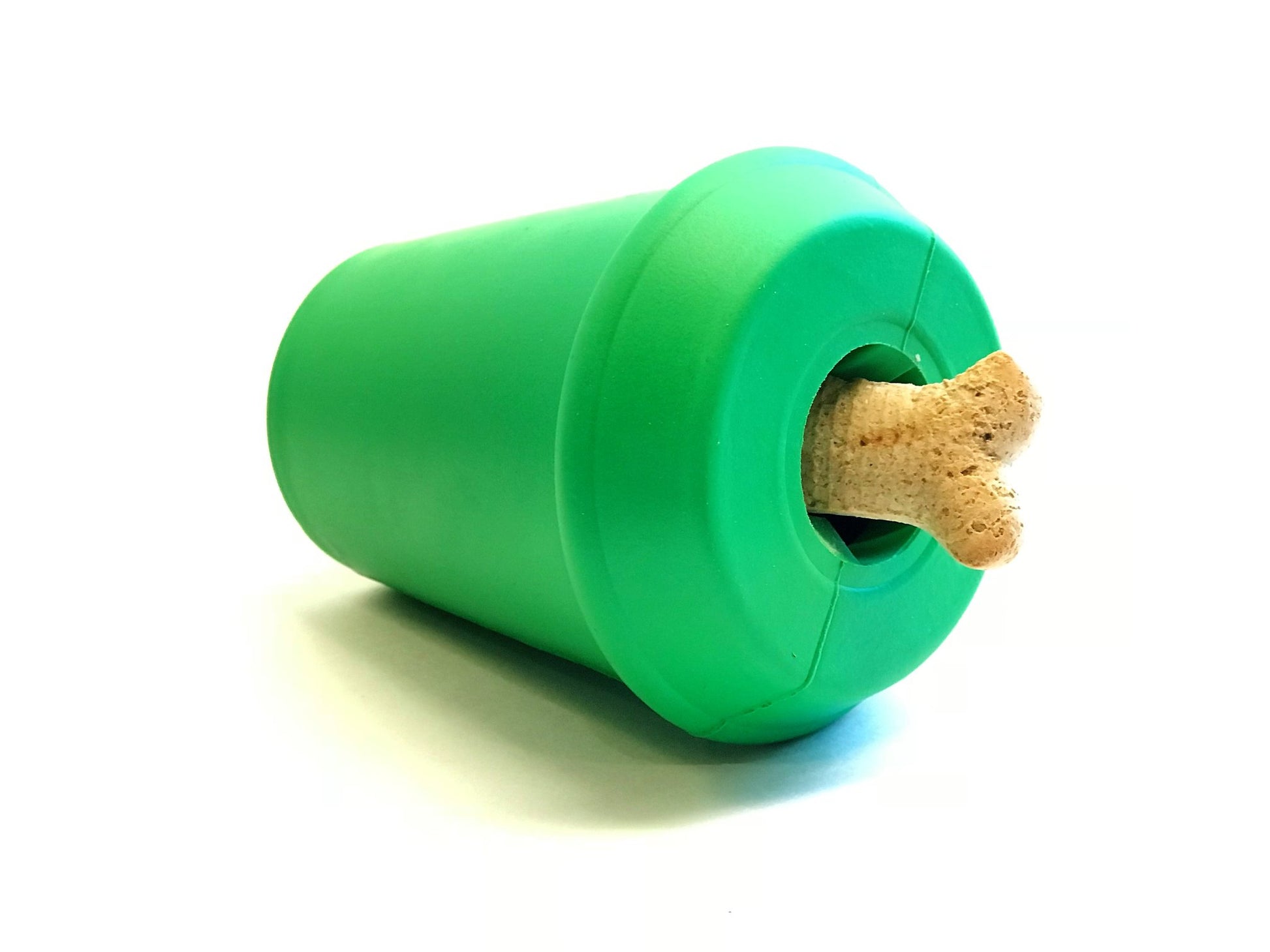 A durable chew toy from the Soda Pup range- a CLEARANCE: Soda Pup COFFEE CUP TOY & TREAT DISPENSER (M & L) from Your Whole Dog- a green plastic bottle with a bone in it.