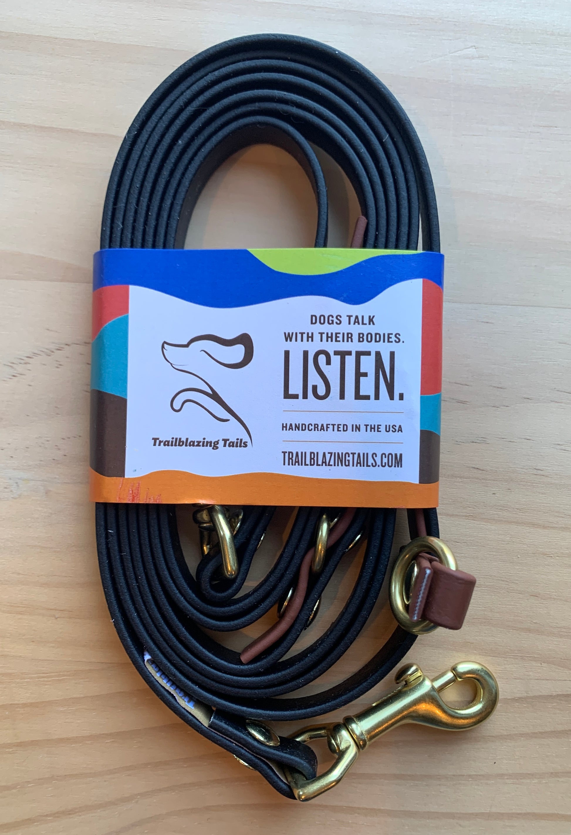 A Trailblazing Tails: The Sunny dog leash in black, with an adjustable length from Your Whole Dog.