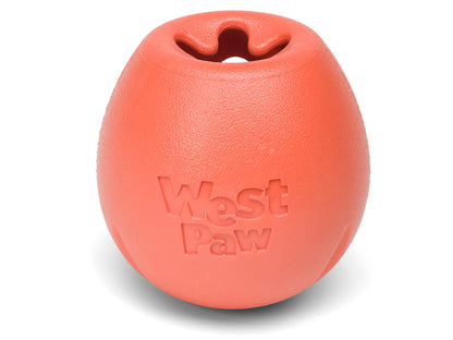 Your Whole Dog's West Paw: Rumbl dog toy - orange. This treat-dispensing toy is a food puzzle toy that will keep your furry friend entertained for hours. The Rumbl features a vibrant orange color, making