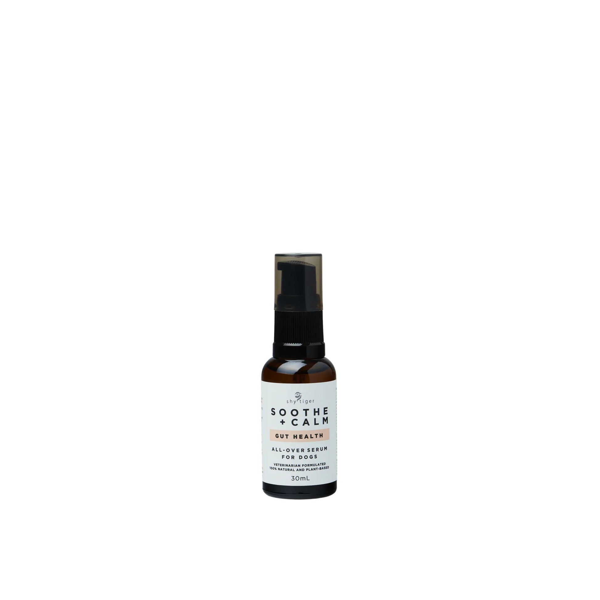 A small brown bottle with a black spray cap, labeled "Shy Tiger: Soothe + Calm GUT HEALTH Serum," is promoted as an "All-in-One Serum for Dogs" by Your Whole Dog. Infused with calming essential oils, this 30ml product supports your pet's well-being and tranquility.