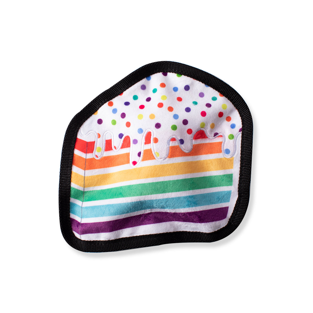 A durable CLEARANCE: Fringe Studio PIECE OF CAKE Squeaker Dog Toy with a colorful cloth and a black border, from the brand Your Whole Dog.