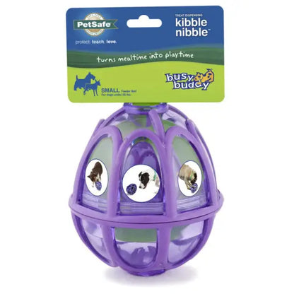 The CLEARANCE: Busy Buddy Kibble Nibble by Your Whole Dog is a meal-dispensing toy that doubles as a slow feeder. This purple ball keeps dogs entertained and mentally stimulated while slowing down their eating pace.